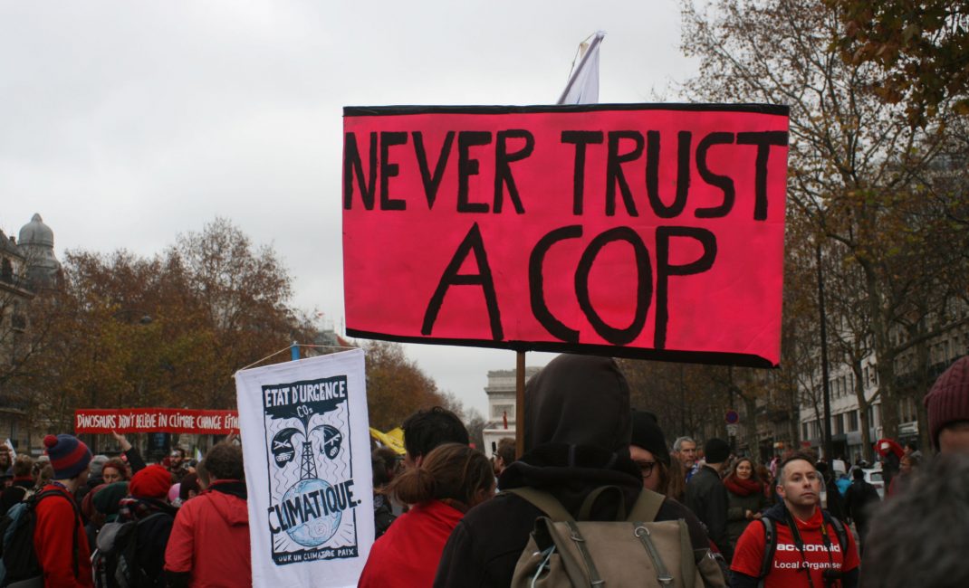'Never trust a cop' banner