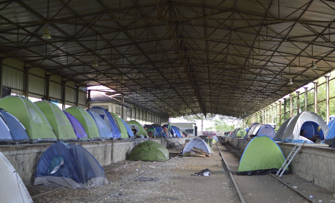 A hangar hosts tents of Kurdish refugees a few meters from Idomeni camp