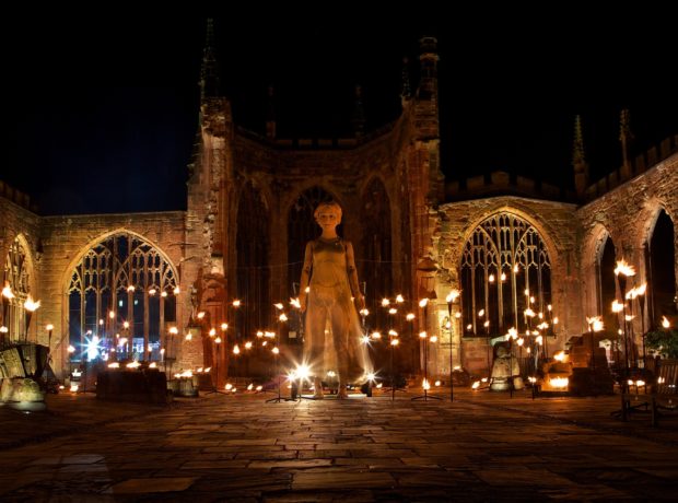 Godiva Awakes, a 20-ft Lady Godiva puppet awakes in Coventry's old cathedral