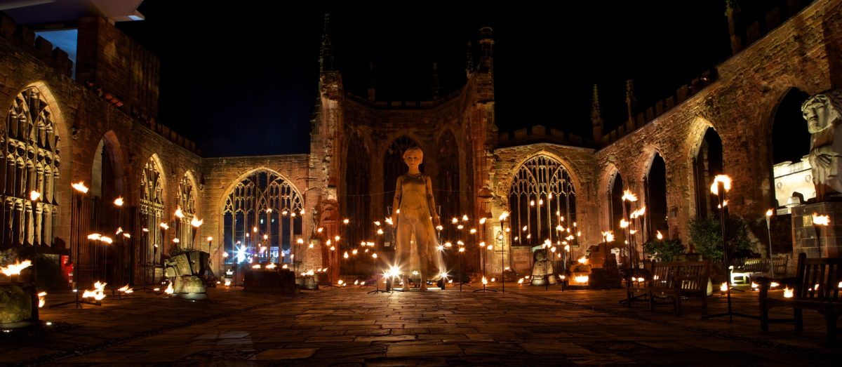 Godiva Awakes, a 20-ft Lady Godiva puppet awakes in Coventry's old cathedral