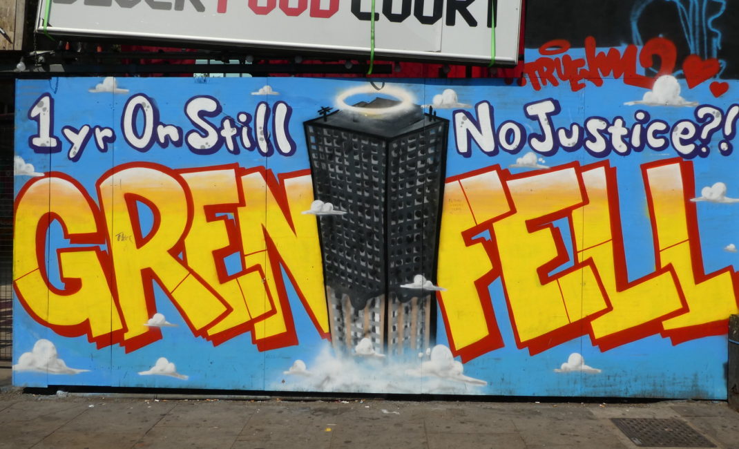 Graffiti reads "Grenfell - One year on still no justice?!"