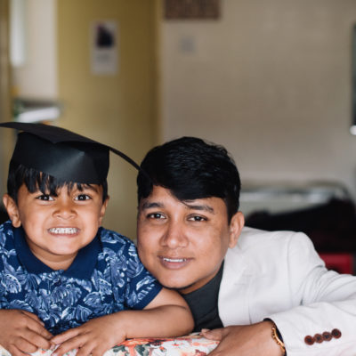 Bradford's British Rohingya Community - Nijam Uddin with his young son by Carolyn Mendelsohn