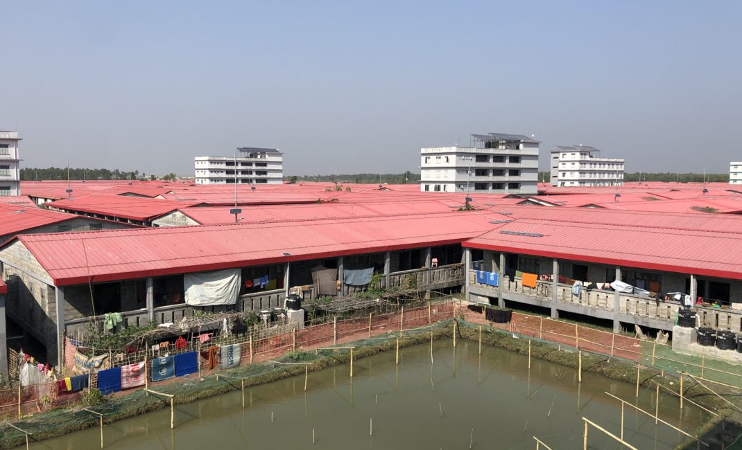 A series of red rooves top temporary homes for Rohingya refugees on Bhasan Char 