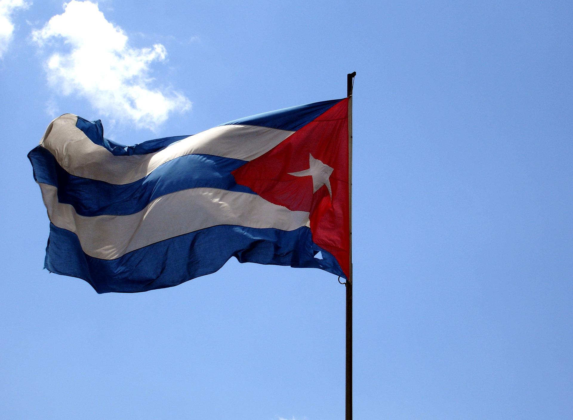 The Cuban flag flying in the sky