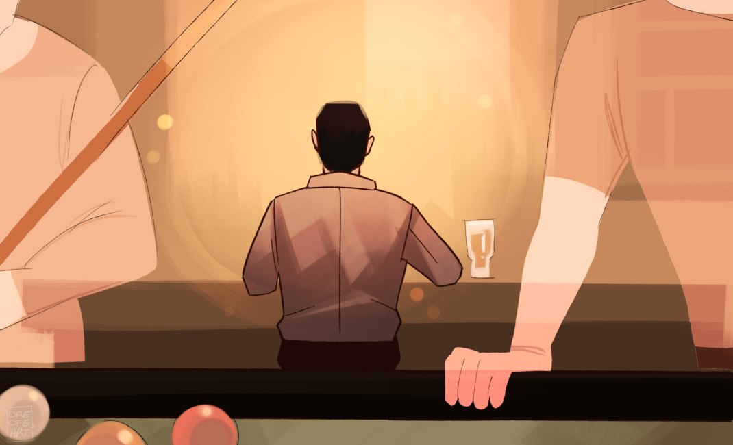A man sitting alone at the bar in a pub. Two men stand behind him playing pool.