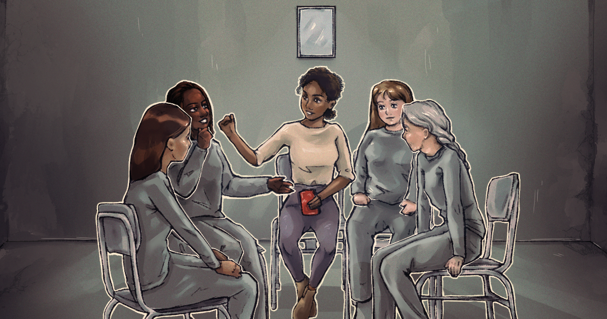 women sitting in a circle at a writing workshop in a US prison