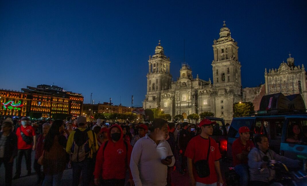 Crowds gather at dusk at the end of the protest against the forced disappearance of Los 43 in Mexico City