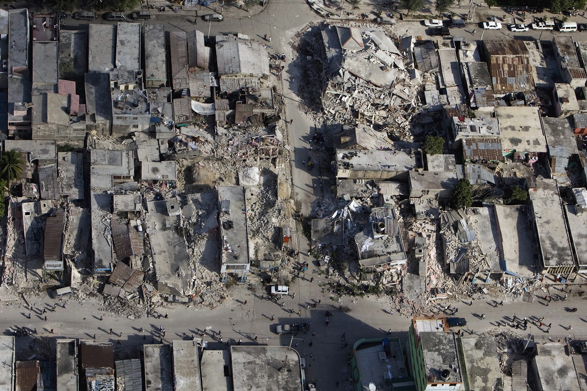 The photo shows the damage after the 2010 Haitian earthquake measuring 7 plus on the Richter scale. Photo by UNDP via Flickr. 