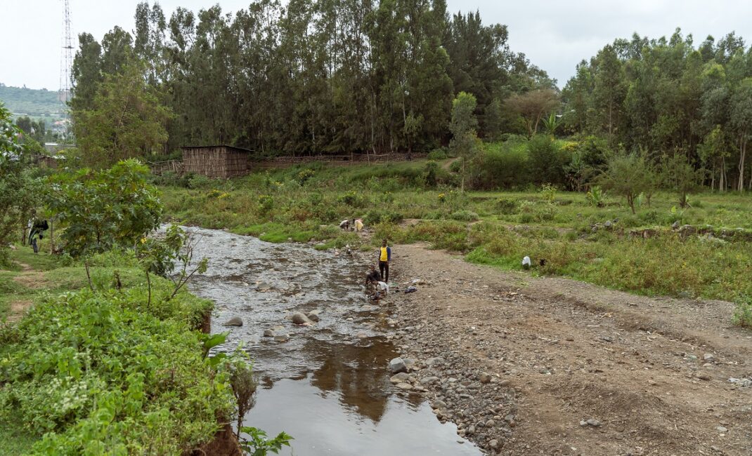 Photograph by Jaclynn Ashly showing the Qeha River, which separated the grounds of the Light of St. George Church from the Haji Elias cemetery Jaclynn Ashly for Lacuna story on religious tensions in Ethiopia.