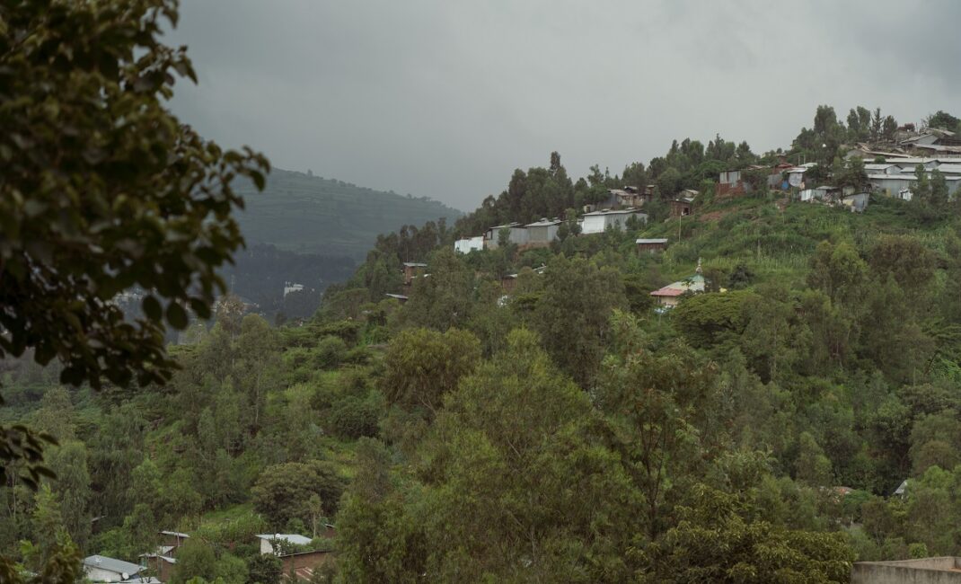 Photograph by Jaclynn Ashly showing Meskele Eysus, an Ethiopian Orthodox church on the side of the hilltop near Addis